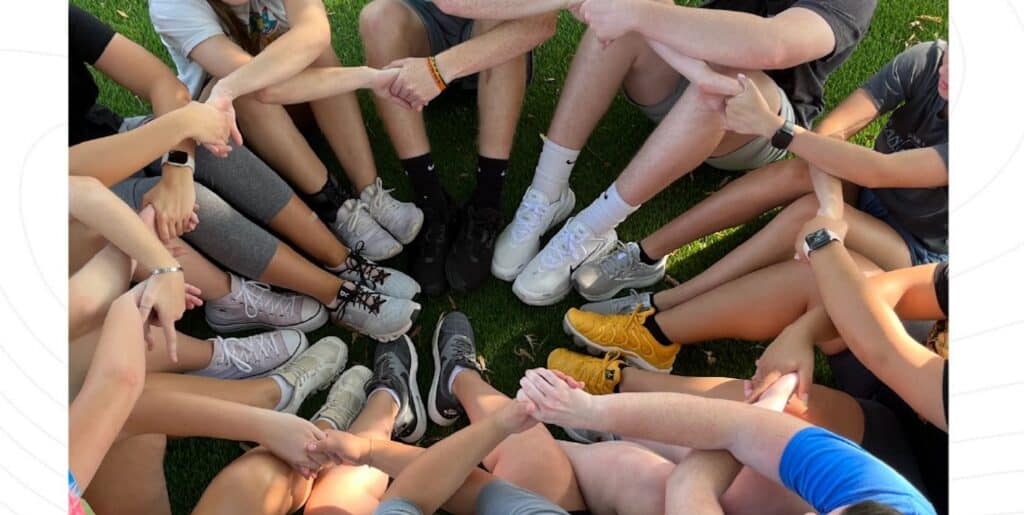 Children participate in outdoor activities and group games at summer day camps while counselors supervise and guide them.